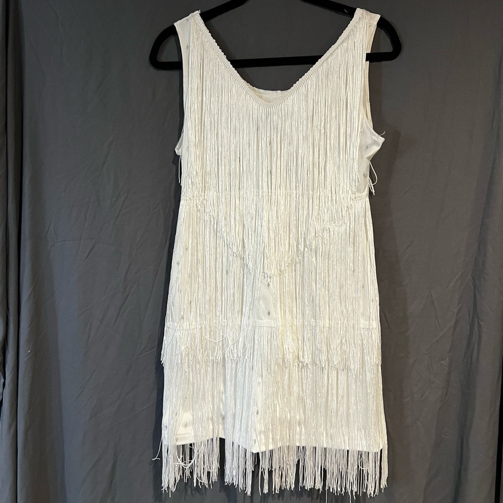 Lot of four white dresses